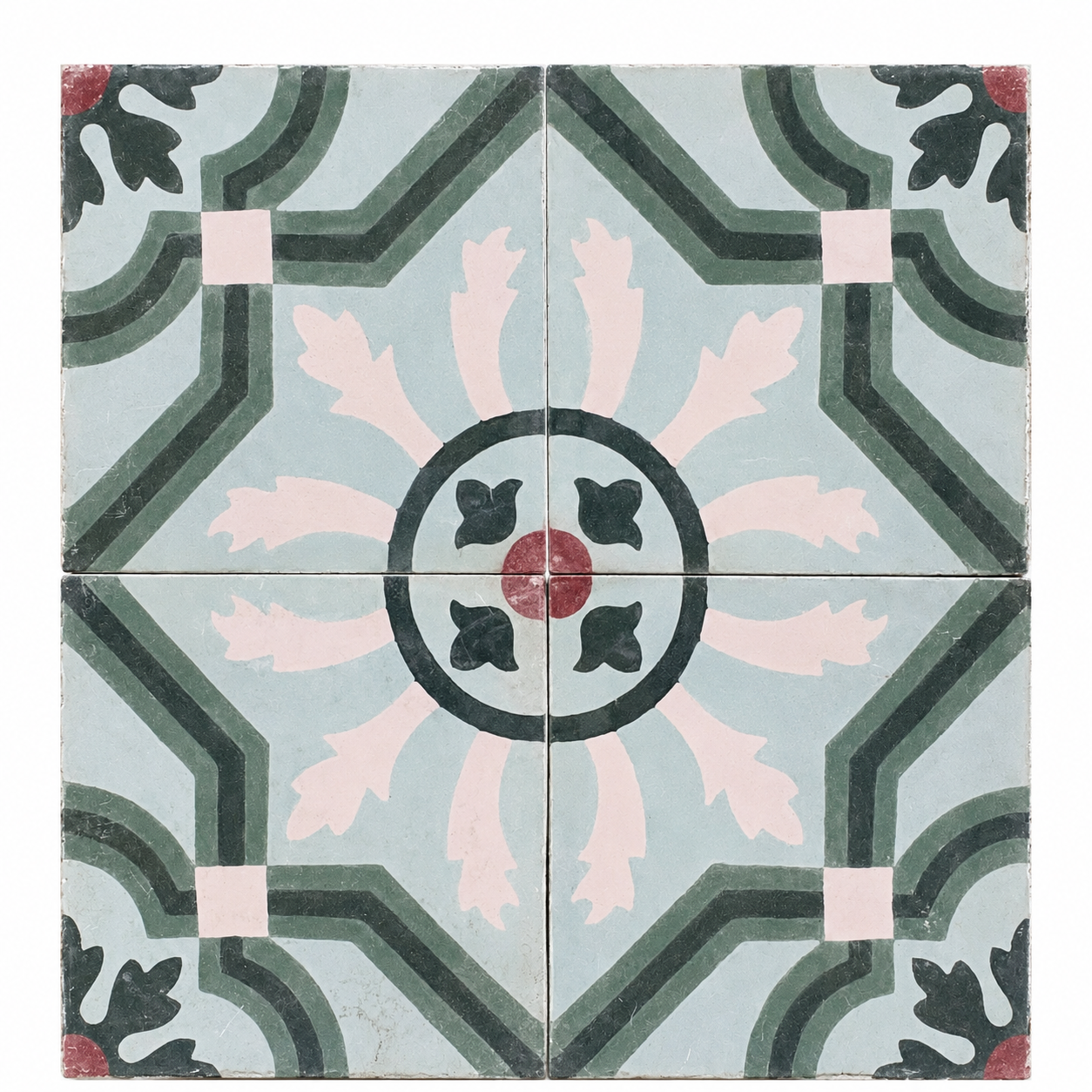 our antique French cement tiles forming a floral medallion pattern in powder blue, blush pink, green, charcoal,